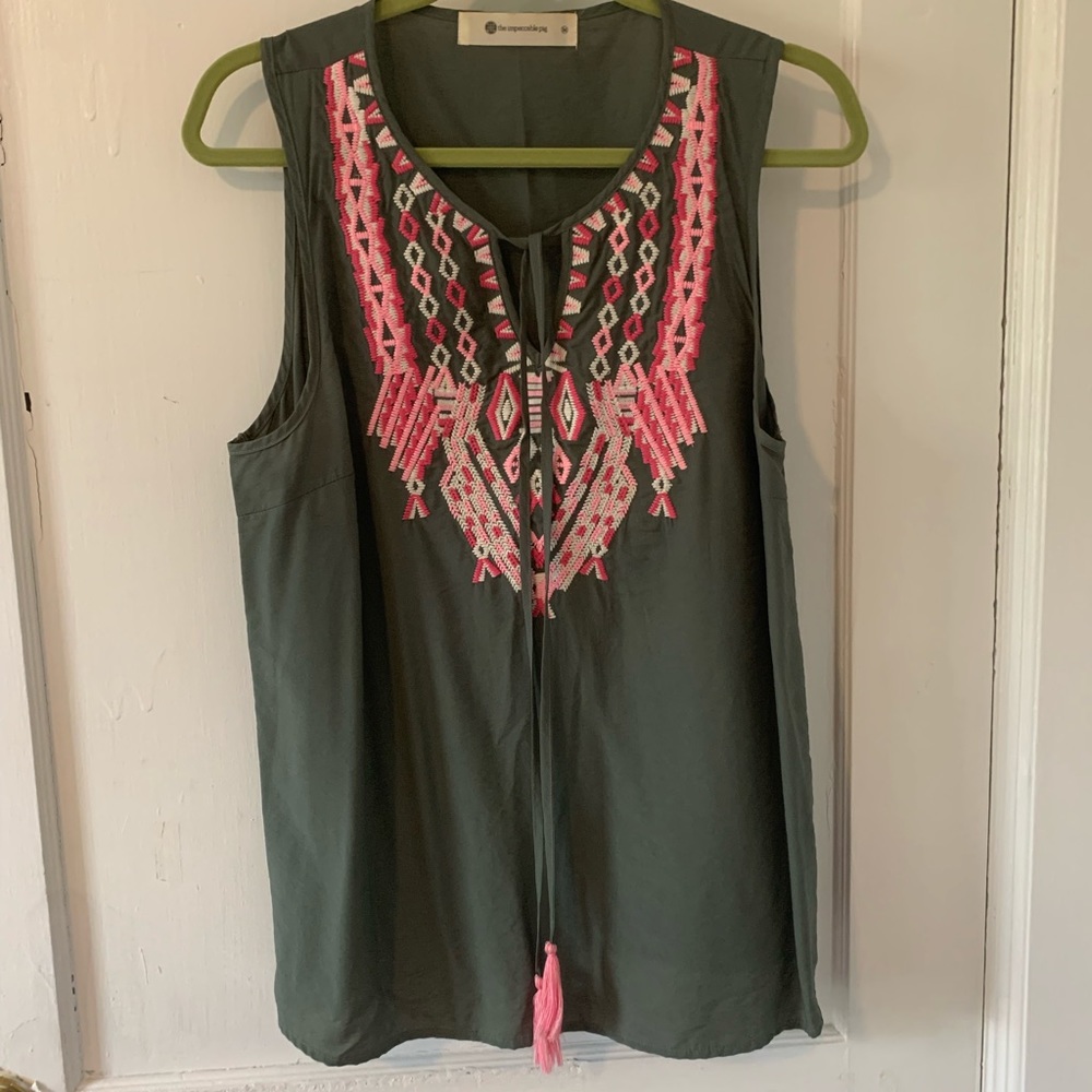 The impeccable pig uniform green shirt with pink embroidery. Size medium.